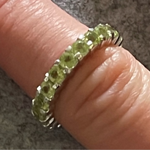 925 Sterling silver eternity ring band, possibly peridot.